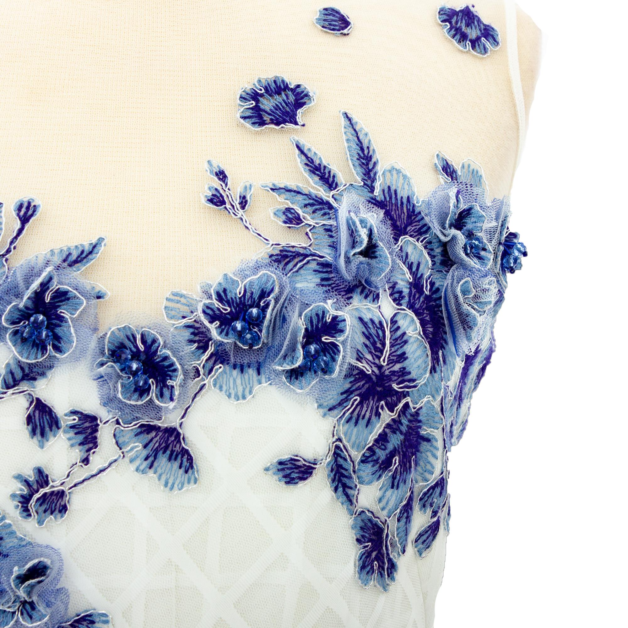 Close-up floral embroidery on linen textile